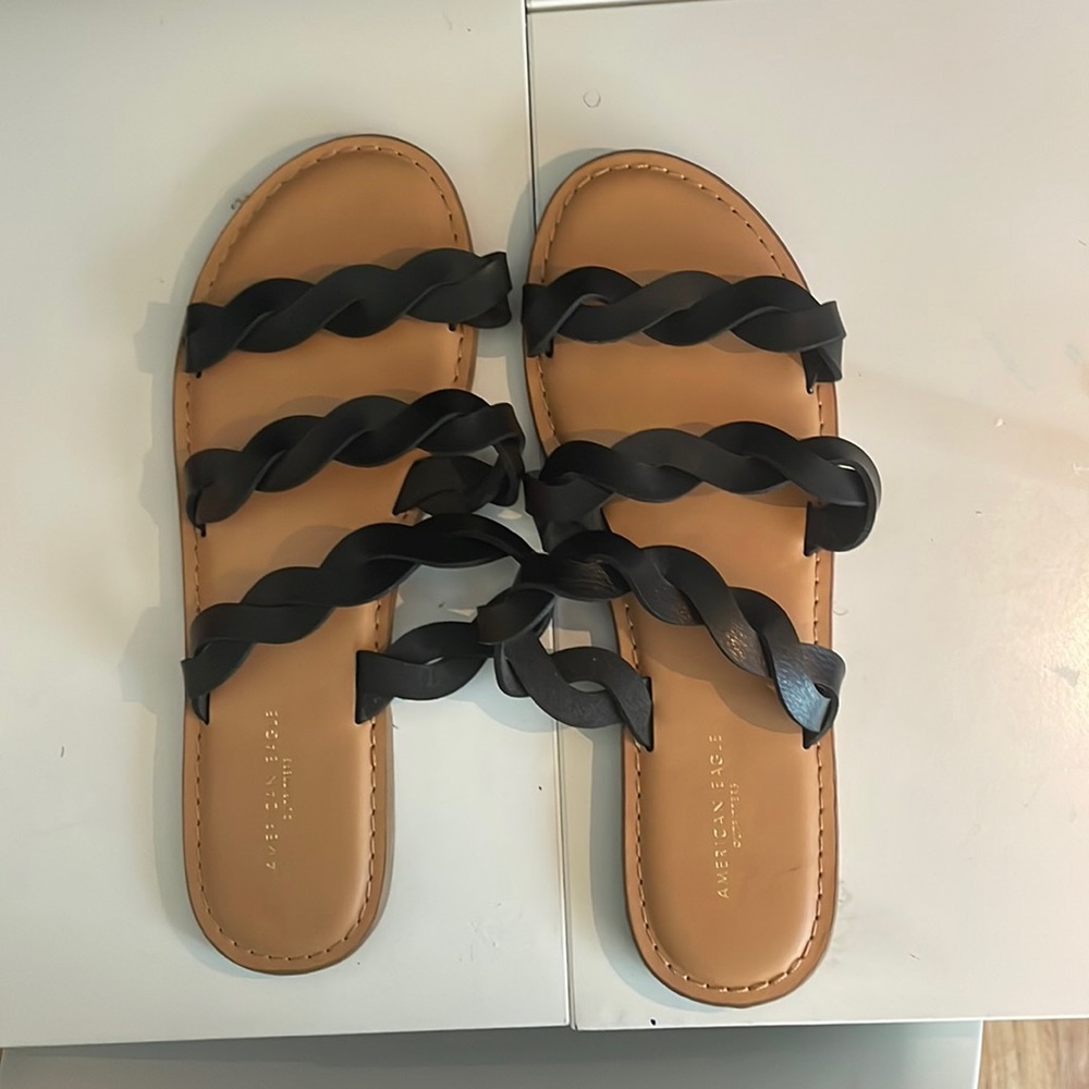 Selling black and brown sandals